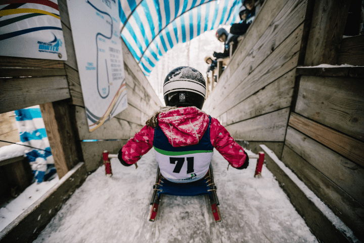 Luge athlete at start ramp for Michigan winter try-athlon