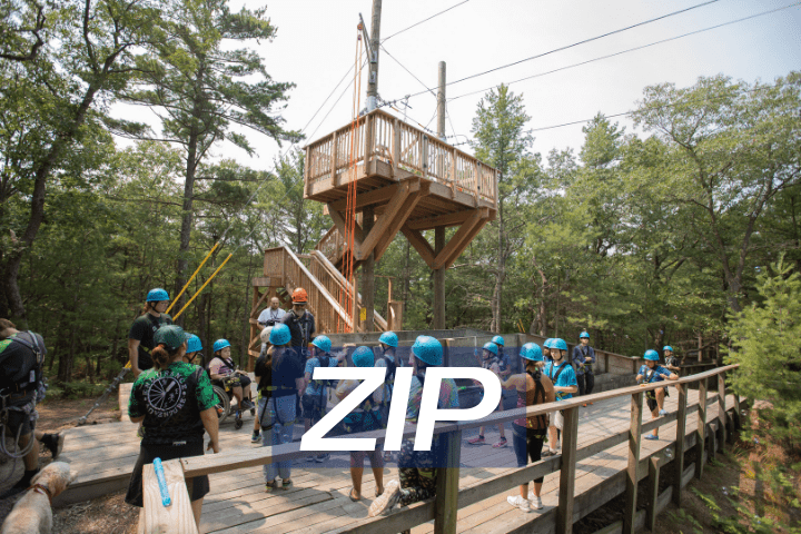 two people on group adventure with Zip line